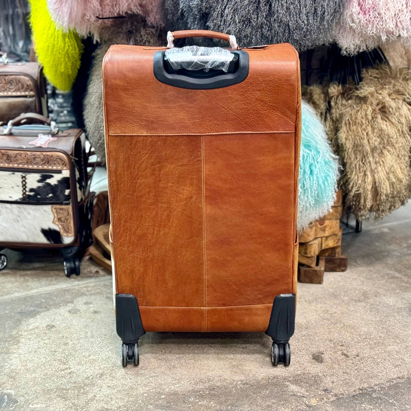 Tooled Cowhide Rolling Luggage XL