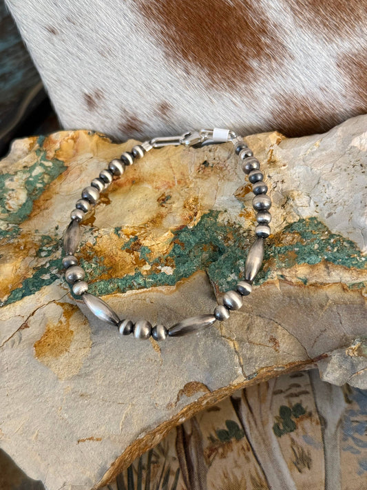 #208- Sterling Pearl Torpedo Bead Bracelet: Stretch