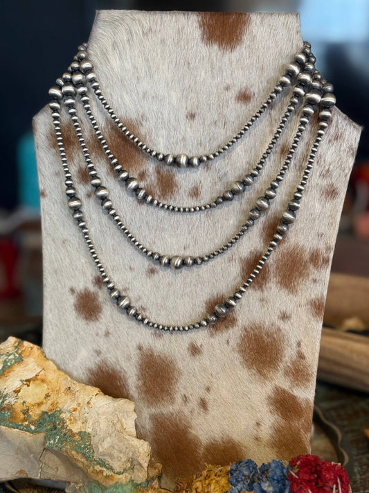 #046 Graduated Sterling Pearls: 24"